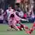 Inter Miami forward Lionel Messi takes a tumble during the first half of a Leagues Cup soccer match