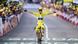 Pauline Ferrand-Prevot crosses the line, arms outstretched in the yellow jersey, on the final stage Pauline Ferrand-Prevot crosses the line, arms outstretched in the yellow jersey, on the final stage