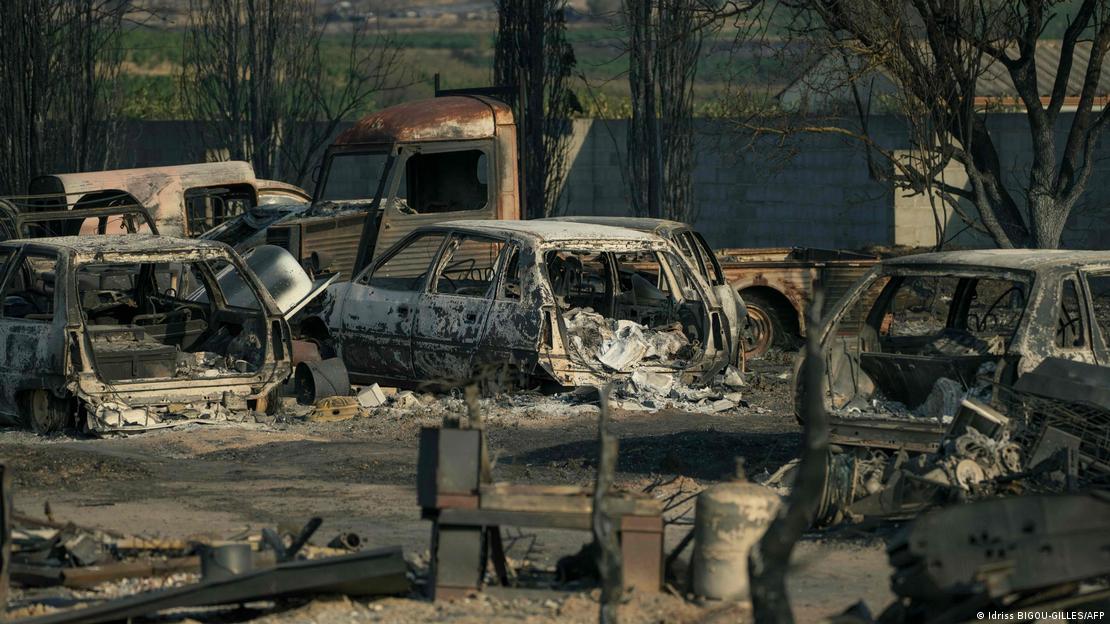 Burnt veichles are seen due to a wildfire that broke out in Saint-Laurent-de-la-Cabrerisse, southwestern France, on August 6, 2025.