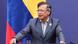 El presidente de Colombia, Gustavo Petro, con una bandera colombiana detrás. El presidente de Colombia, Gustavo Petro, con una bandera colombiana detrás.