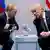 Trump and Putin lean toward each other to talk during the G20 summit in Hamburg in July 2017