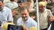 Congress party leader Rahul Gandhi enters the police station surrounded by officers Congress party leader Rahul Gandhi enters the police station surrounded by officers