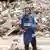 Al Jazeera journalist Anas al-Sharif reports near the Arab Ahli (Baptist) Hospital in Gaza City on October 10, 2024