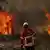Firefighter fighting fire in Portugal