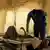 A doctor visits a cholera patient at an isolation unit outside the Bashayer Hospital, south of Khartoum on May 31, 2025