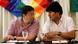 Luis Arce y Evo Morales se miran durante una reunión en Buenos Aires.