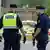 Police work at the scene outside a mosque in Orebro after a shooting