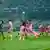 Mohun Bagan (green and red) in action against Bengaluru (pink) earlier this year.