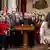 Republican Texas State Representative Todd Hunter, surrounded by most of the Republican members of the House of Representatives, speaks during a session as Democratic lawmakers, who left the state to deny Republicans the opportunity to redraw the state's 38 congressional districts, begin returning to the Texas State Capitol in Austin, Texas, U.S. August 20, 2025