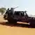 Nigeria soldiers patrol near a school in Katsina state on December 16, 2020