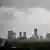 Storm clouds visible above skyscrapers in Vinh city, Vietnam