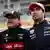 Valteri Bottas (izq.) será compañero de "Checo" Pérez en Cadillac. La foto muestra a ambos pilotos en el Gran Premio de Canadá (2023) cuando Bottas corría con Alfa Romeo, y Pérez para Red Bull.