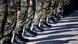 Soldiers' feet in a line. Soldiers' feet in a line.