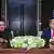Kim Jong Un and Donald Trump sitting at a table in 2018
