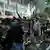 People shout slogans during a protest following the death of a ride-hailing driver who was run over by a police armored car in Thursday's rally against lavish allowances given to parliament members, in Jakarta, Indonesia on Friday August 29, 2025.