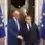 Friedrich Merz (izq.) y Emmanuel Macron.