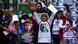 Hombres y mujeres con camisetas y pancartas con los rostros de personas desaparecidas, en una manifestación en Ciudad de México. (Archivo). 