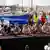 Brasileiro Thiago Ávila fala em coletiva de imprensa ao lado de ativistas que integram a flotilha no porto de Barcelona