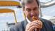 Markus Söder posing with a sausage in a breadroll Markus Söder posing with a sausage in a breadroll