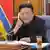 Diktatur Korea Utara Kim Jong Un sedang melakukan percakapan telefon