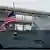 The US flag flutters on the stern of the US Navy guided missile destroyer USS Sampson DDG-102, docked near the entrance to the Panama Canal, amid a large buildup of US naval forces in and around the Southern Caribbean, in Panama City, Panama on August 31, 2025