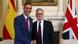 Spanish Prime Minister Pedro Sanchez and British Prime Minister Keir Starmer shake hands in front of Spanish and British flags inside 10 Downing Street office Spanish Prime Minister Pedro Sanchez and British Prime Minister Keir Starmer shake hands in front of Spanish and British flags inside 10 Downing Street office