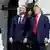Karol Nawrocki and U.S. President Donald Trump look up in the air at the White House