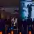 People pay their respects to designer Giorgio Armani, who died at age 91 on Thursday, inside the Armani/Teatro in Milan, northern Italy