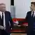 François Bayrou und Emmanuel Macron sprechen miteinander 