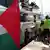 Activists load a boat with goods prior to the departure of the flotilla aimed at breaking the Israeli blockade of the Gaza Strip