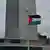 The Palestinian flag in front of the United Nations building in New York