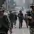 Nepali army soldiers patrol at the road near the Singha Durbar office complex that houses the Prime Minister's office and other ministries