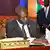 South Sudan Vice President, Riek Machar, signs a peace deal reached with the South Sudanese government in Khartoum on June 27, 2018