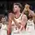 German small forward Franz Wagner claps his hands after Germany's victory against Finland in the EuroBasket semifinals