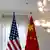 The American and Chinese flags are photographed, during a bilateral meeting between the United States and China, in Geneva, Switzerland