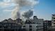 Un nuage de fumée s'échappe de la ville de Gaza. Un nuage de fumée s'échappe de la ville de Gaza.