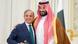 Mohammad bin Salman (right) puts his arm around Shehbaz Sharif (left), both smiling at camera Mohammad bin Salman (right) puts his arm around Shehbaz Sharif (left), both smiling at camera