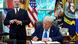 Donald Trump signs and executive order in the Oval Office Donald Trump signs and executive order in the Oval Office