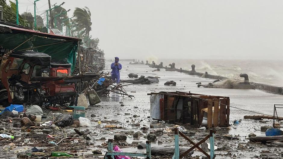 Flooded street and damaged buildings after Super Typhoon Ragasa