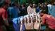 People transport the dead body of a transgender woman outside a hospital in Karachi People transport the dead body of a transgender woman outside a hospital in Karachi