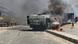 A bus burning on a street in Leh, Ladakh A bus burning on a street in Leh, Ladakh