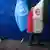 Die Flagge der Vereinten Nationen und die Flagge des Iran nebeneinander