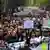 People attend a demonstration called by rights groups under the banner: "There are no good or bad victims, only femicides"