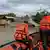 The Philippine Coast Guard rescuing residents from their flooded house after Bualoi landfall