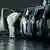 A worker performs a final check on new Volkswagen ID.3 electric cars at the Volkswagen plant, in Dresden, Germany, on May 14, 2025