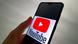 Логотип YouTube-Logo на экране смартфона Логотип YouTube-Logo на экране смартфона