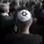 A man is seen from behind, he is wearing a kippah.