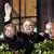 Left to right: Former Foreign Minister Hans-Dietrich Genscher, Hannelore Kohl, Helmut Kohl (waving), Richard von Weizsäcker during celebrations on the day of Reunification in 1990