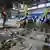 Police and rescuers inspect the damage at an indoor arena in San Remigio town, Cebu province, central Philippines