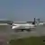 An airplane at a runway at New York's LaGuardia Airport on May 11, 2023 